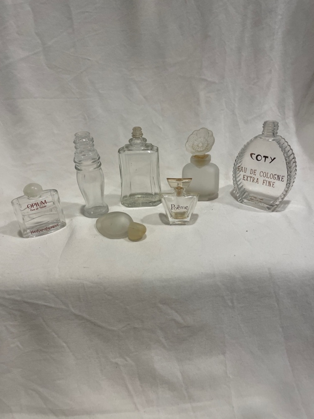 Vintage small perfume bottles.Clear Glass Opium Mini Bottle with Frosted Stopper
